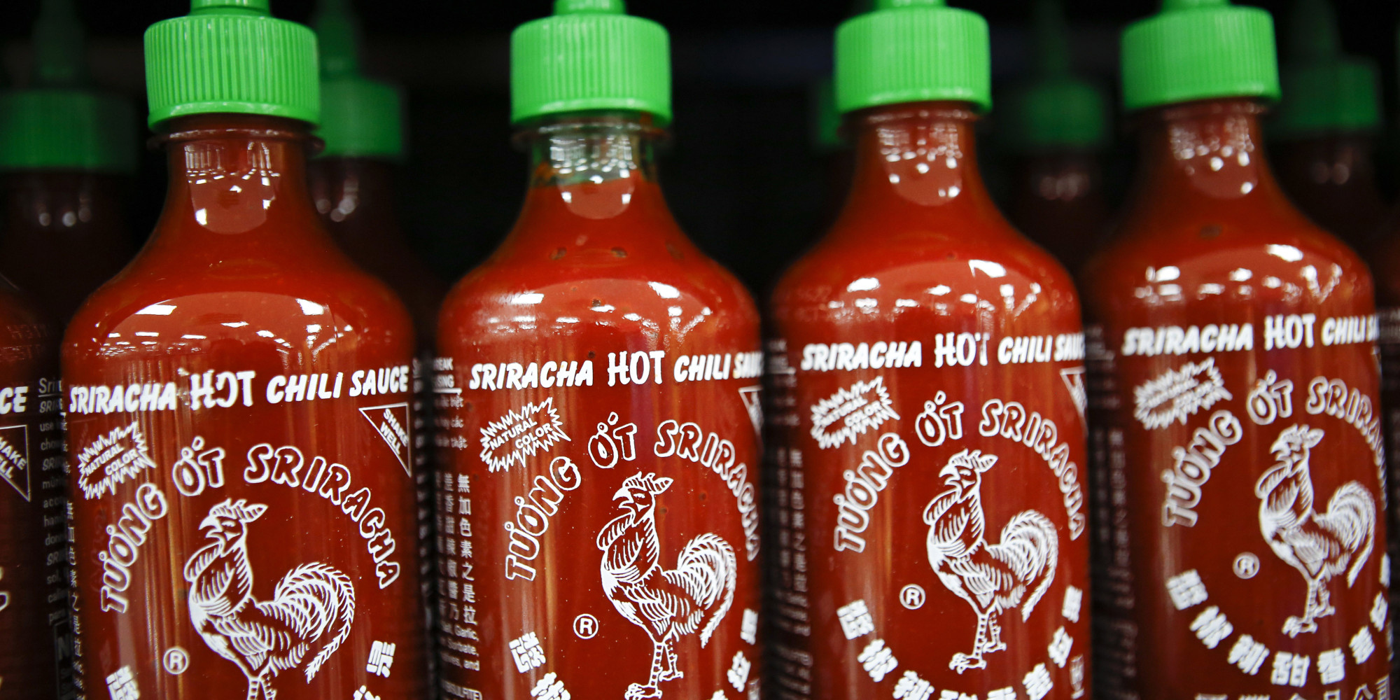 Huy Fong Foods Inc. Sriracha sauce is displayed for sale during the grand opening of a Wal-Mart Stores Inc. location in the Chinatown neighborhood of Los Angeles, California, U.S., on Thursday, Sept. 19, 2013. Wal-Mart Stores Inc. will phase out 10 chemicals it sells in favor of safer alternatives and disclose the chemicals contained in four product categories, the company announced Sept. 12. Photographer: Patrick T. Fallon/Bloomberg via Getty Images